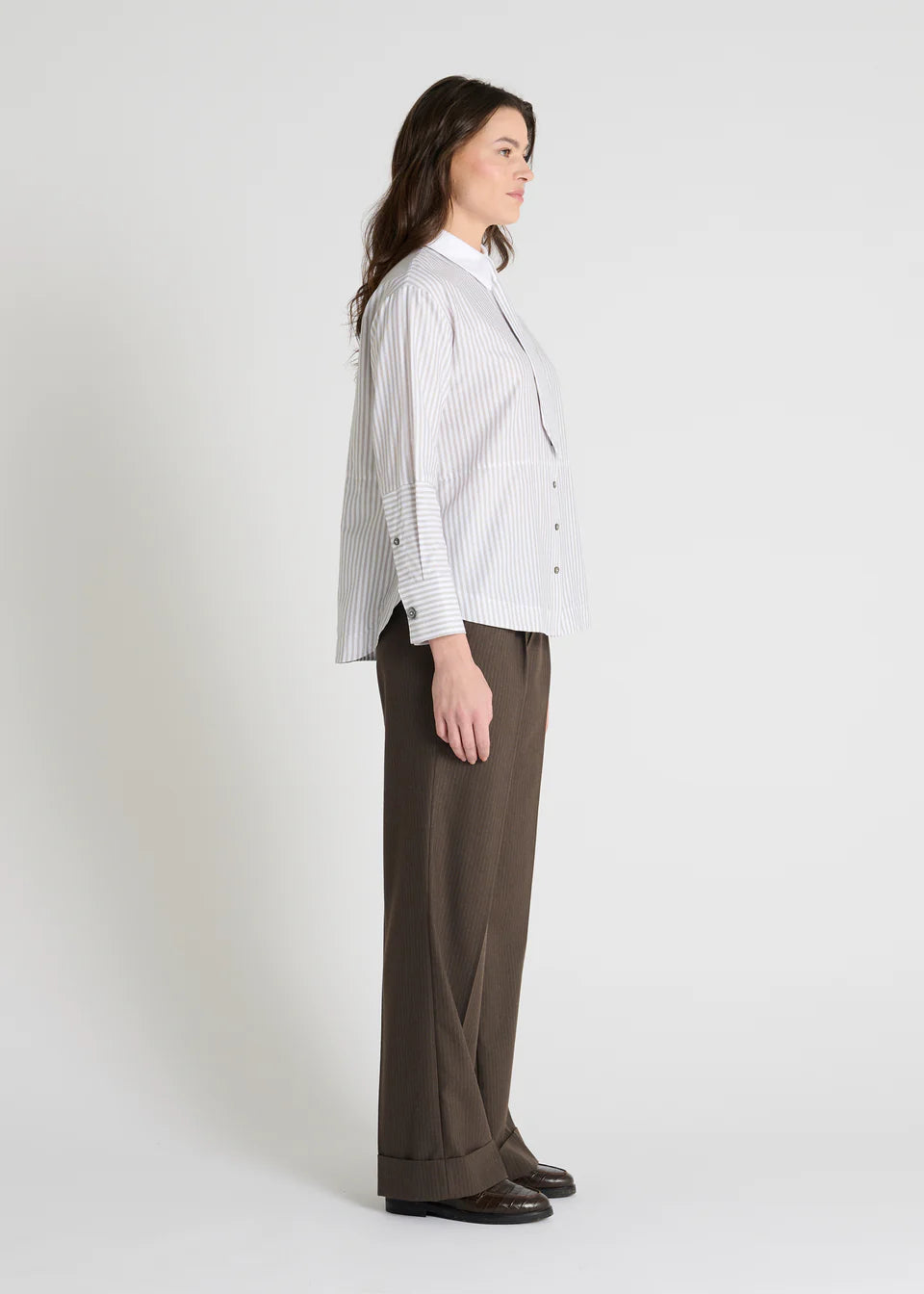 grey pinstripe shirt with a tie and contrasting white collar side view