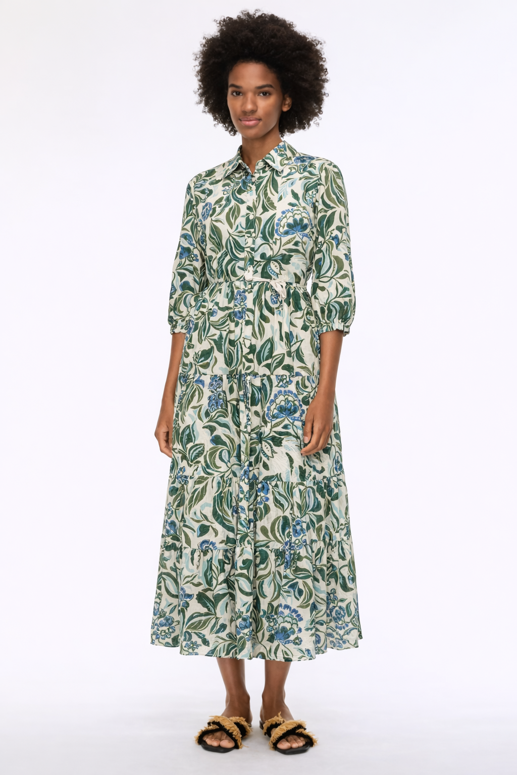 Gree floral dress on a model on white background 