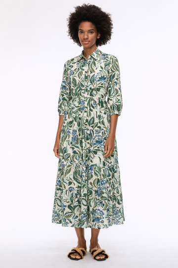 Gree floral dress on a model on white background 