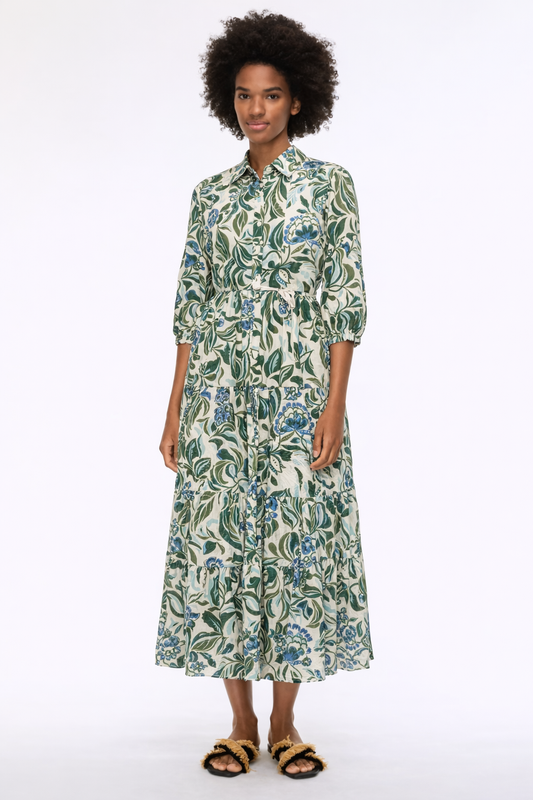 Gree floral dress on a model on white background 