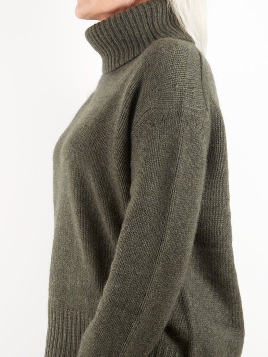 Side view of roll neck knit in heavy gauge cashmere