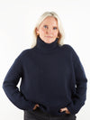 Heavy weight navy cashmere knit on model