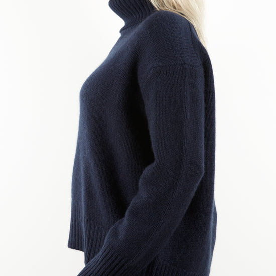 Side view of navy cashmere knit