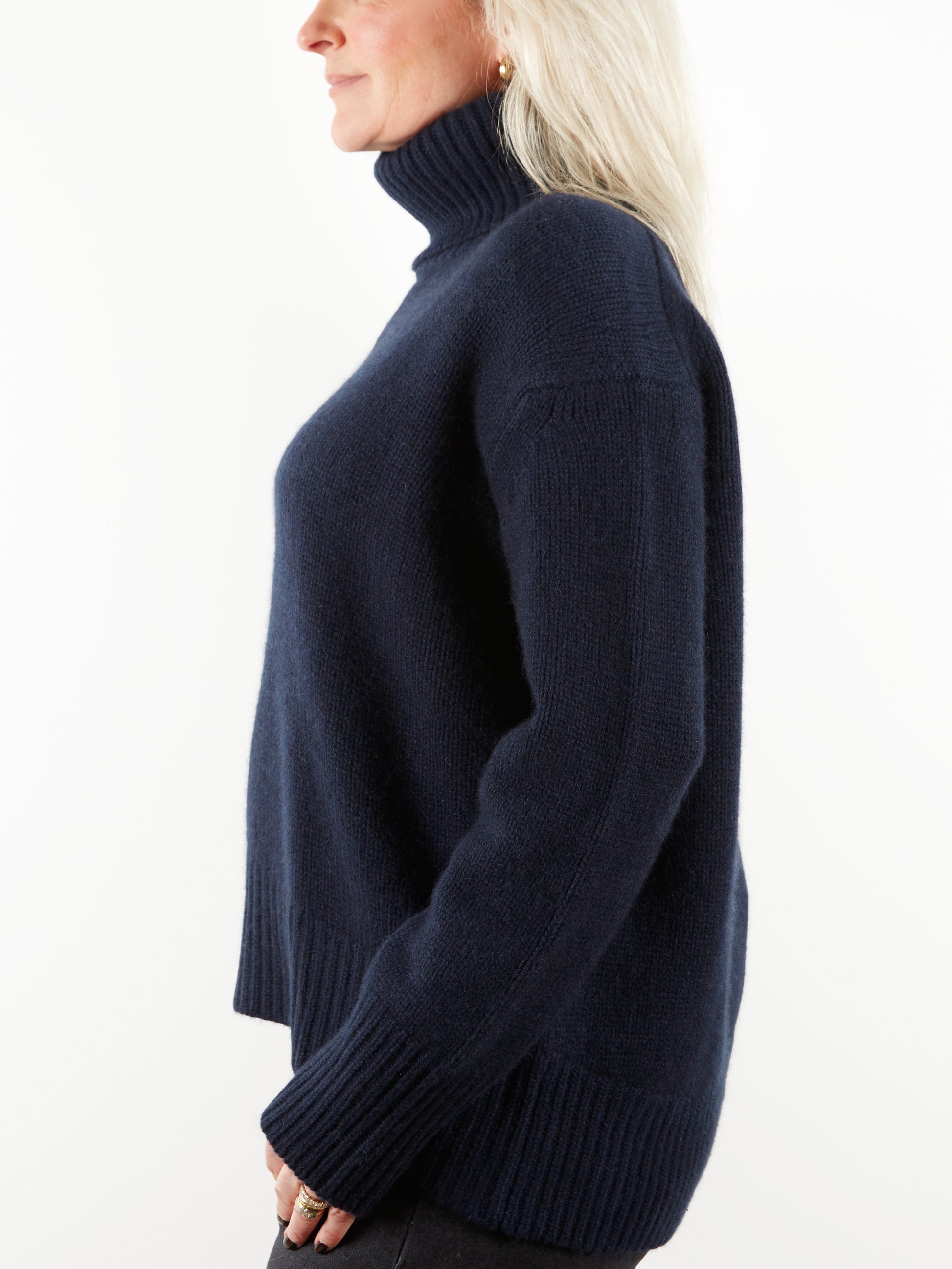 Side view of navy cashmere knit