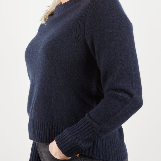 Side view of navy jumper