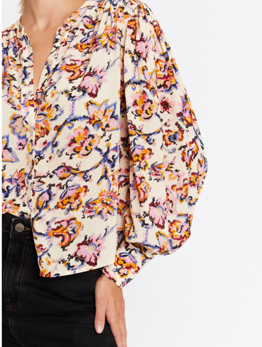 Cream blouse with pink orange and blue floral print with long puff sleeves