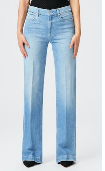 Straight leg light blue stone washed five pocket jeans with light distressing