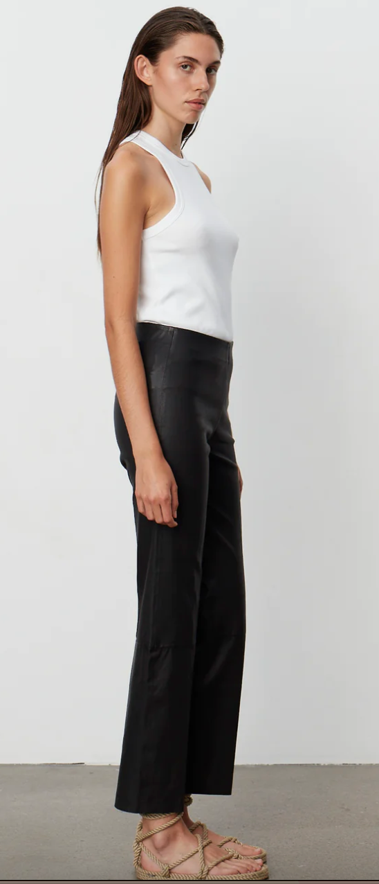 Black lambs leather trousers with elasticated waistband panelling and raw hem