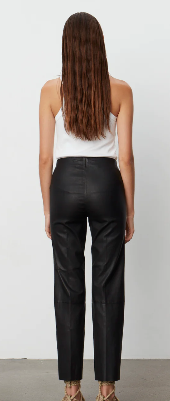 Black lambs leather trousers with elasticated waistband panelling and raw hem