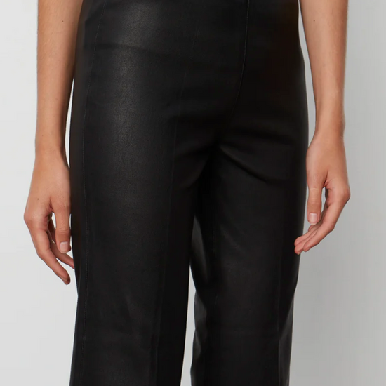 Black lambs leather trousers with elasticated waistband panelling and raw hem