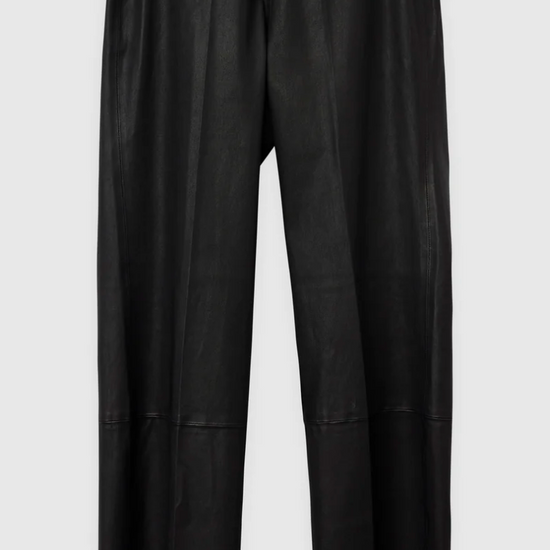 Black lambs leather trousers with elasticated waistband panelling and raw hem