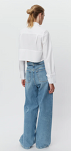  Cropped white shirt with classic collar and long sleeves with full length covered placket