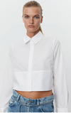  Cropped white shirt with classic collar and long sleeves with full length covered placket