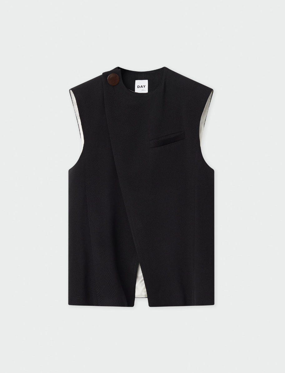 Black asymmetric waistcoat with large button on right shoulder and centre rear vent