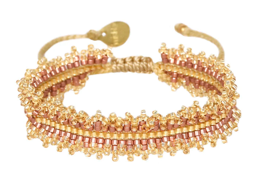 Pink toned beaded adjustable friendship bracelet