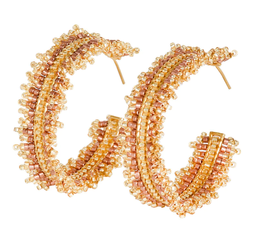 Beaded hoop earrings in gold with  a hint of pink