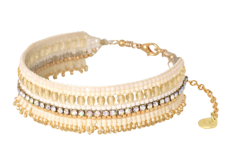 Beaded cream and gold toned beaded bracelet with lobster catch