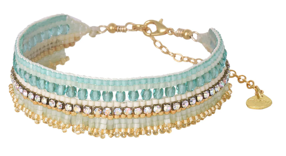 Turquoise beaded bracelet with gold plated lobster claw catch and extender chain