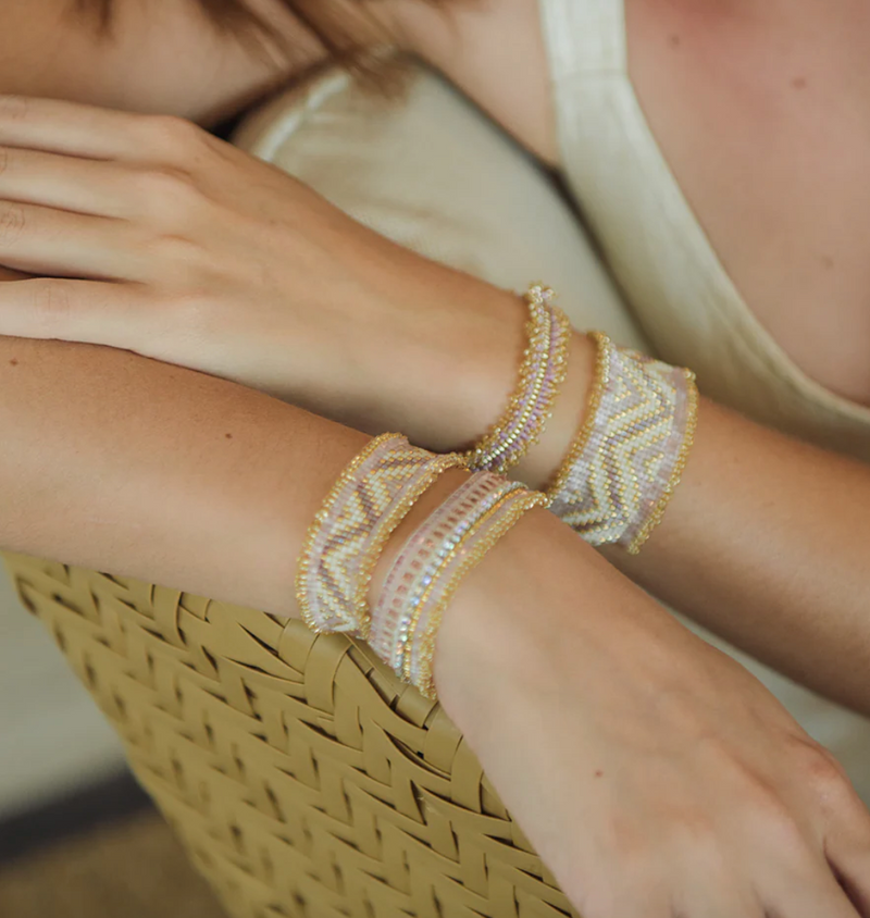 model shot of layered beaded bracelets
