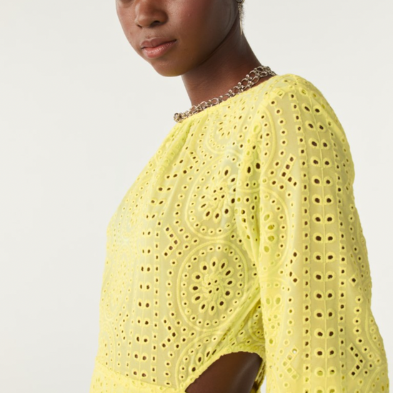 Yellow broderie anglais midi dress with three quarter length sleeves with waist cut outs and scalloped hem