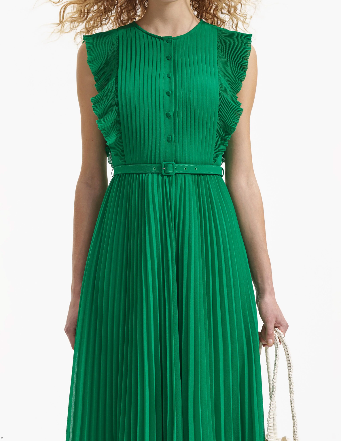 Emerald green sleeveless dress with pintuck bodice ruffle over the shoulder and midi length skirt with delicate pleats with fabric belt