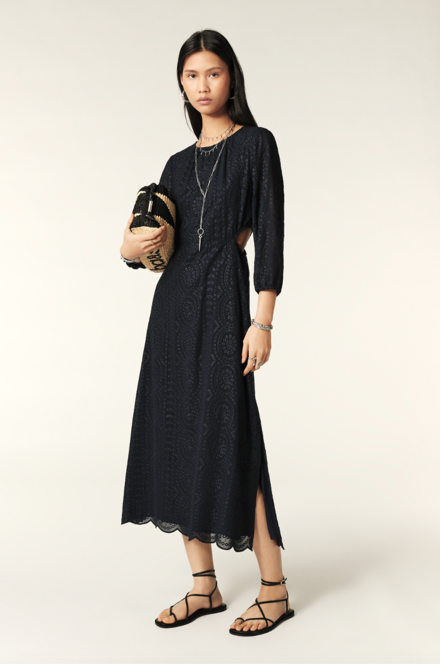 Navy midi dress with three quarter length sleeves waist cut outs and open back and scalloped hem with broderie anglais throughoutNavy midi dress with three quarter length sleeves waist cut outs and open back and scalloped hem with broderie anglais throughout