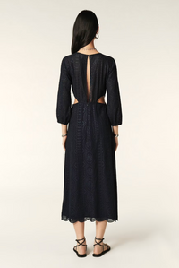 Navy midi dress with three quarter length sleeves waist cut outs and open back and scalloped hem with broderie anglais throughoutNavy midi dress with three quarter length sleeves waist cut outs and open back and scalloped hem with broderie anglais throughout