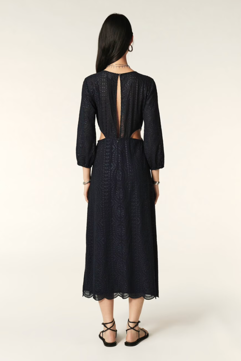 Navy midi dress with three quarter length sleeves waist cut outs and open back and scalloped hem with broderie anglais throughoutNavy midi dress with three quarter length sleeves waist cut outs and open back and scalloped hem with broderie anglais throughout