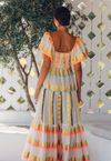 Ecru dress with gold and bright embroidrey throughout with gathered neckline and fluted short sleeves empire line with elasticated waist with full double tiered full skirt