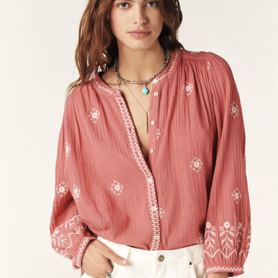 pink cotton shirt with white embroidery detailing