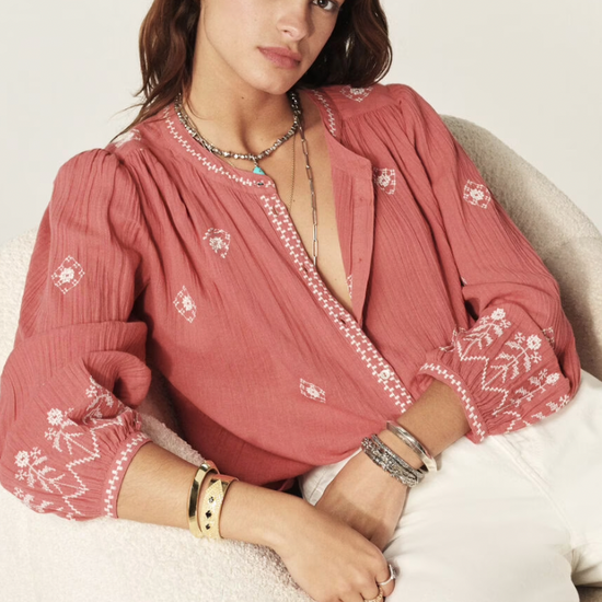 pink cotton shirt with white embroidery detailing