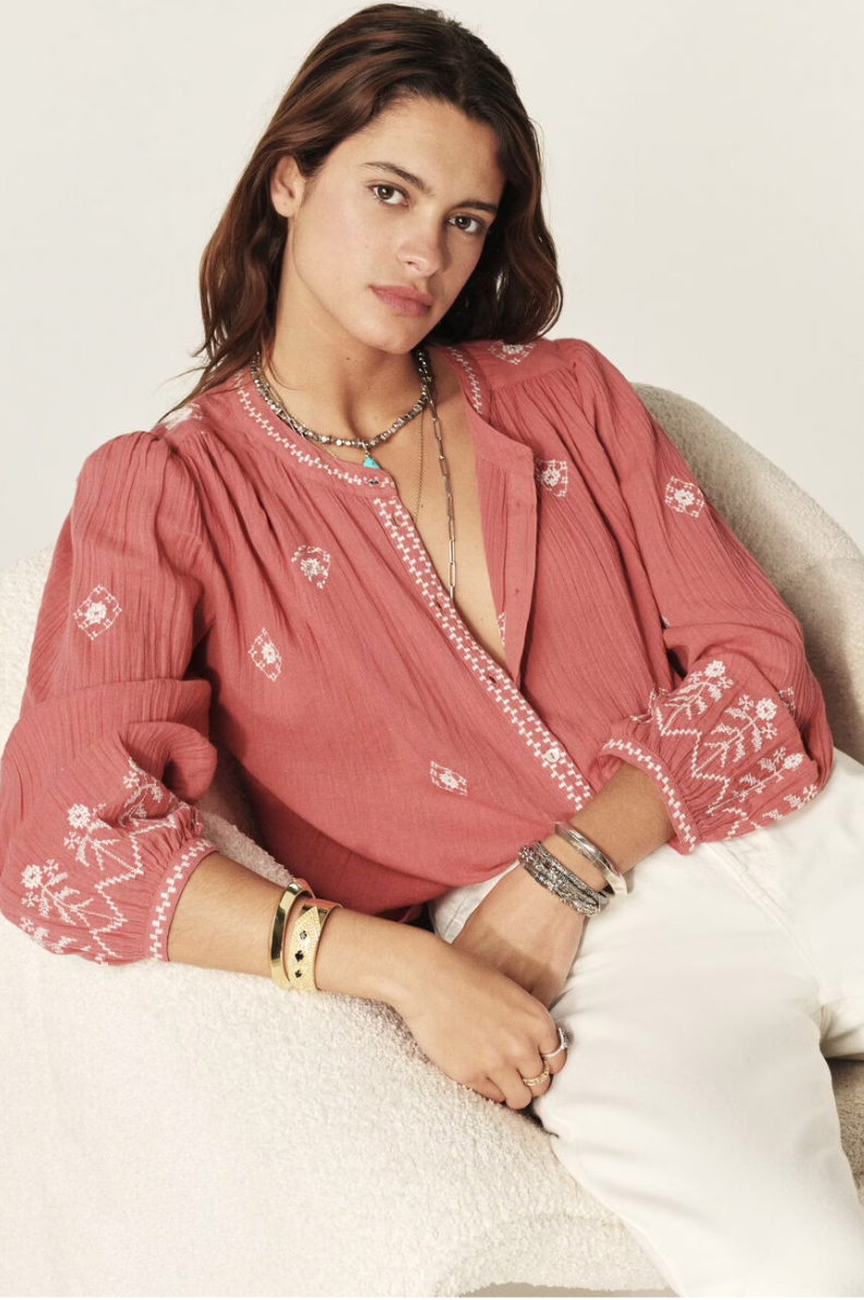 pink cotton shirt with white embroidery detailing