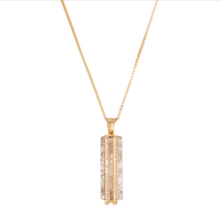 quartz long pendant gold chain necklace with diamante detailing close up