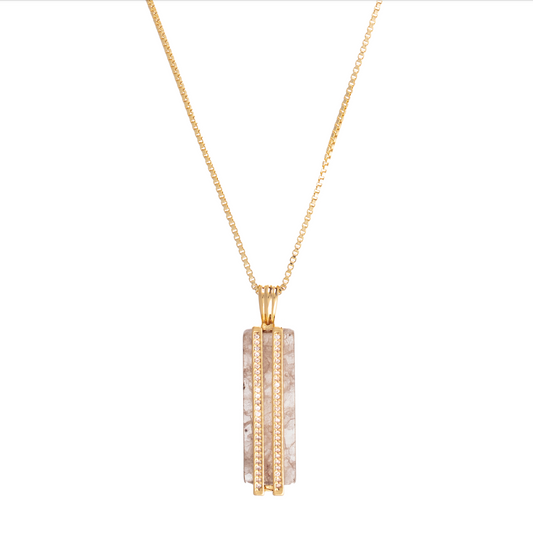 quartz long pendant gold chain necklace with diamante detailing close up