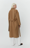 camel coat with belt and side slits rear view 