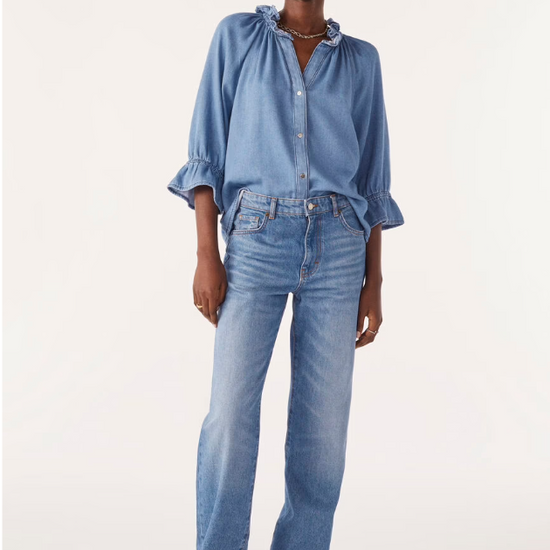 blue denim shirt with ruffled neck and cuffs