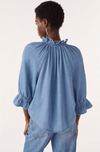 blue denim shirt with ruffled neck and cuffs rear view