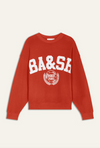 red loop back cotton sweatshirt with round neck long sleeves  and white decal on the front