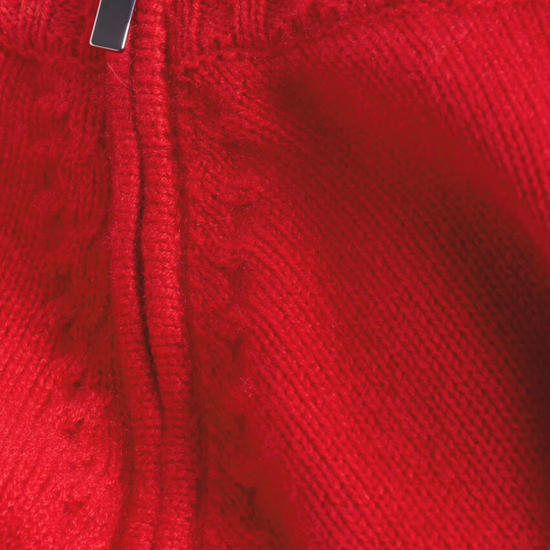 red cashmere jumper with raglan sleeves and zip at the neck close up