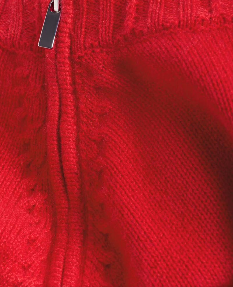 red cashmere jumper with raglan sleeves and zip at the neck close up