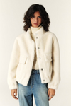 off white faux fur jacket with elasticated waist and cuffs with high neck and pockets model shot