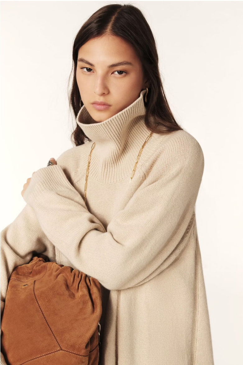 beige jumper dress with ribbed neck and cuffs and turtle neck close up