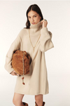 beige jumper dress with ribbed neck and cuffs and turtle neck model shot 