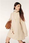 beige jumper dress with ribbed neck and cuffs and turtle neck model shot