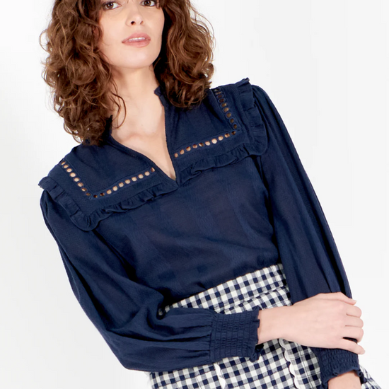 navy shirt with elasticated cuffs, ruffled collar and lace detail