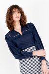 navy shirt with elasticated cuffs, ruffled collar and lace detail