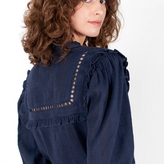 navy shirt with elasticated cuffs, ruffled collar and lace detail rear view 