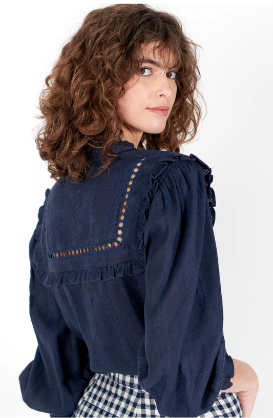 navy shirt with elasticated cuffs, ruffled collar and lace detail rear view 