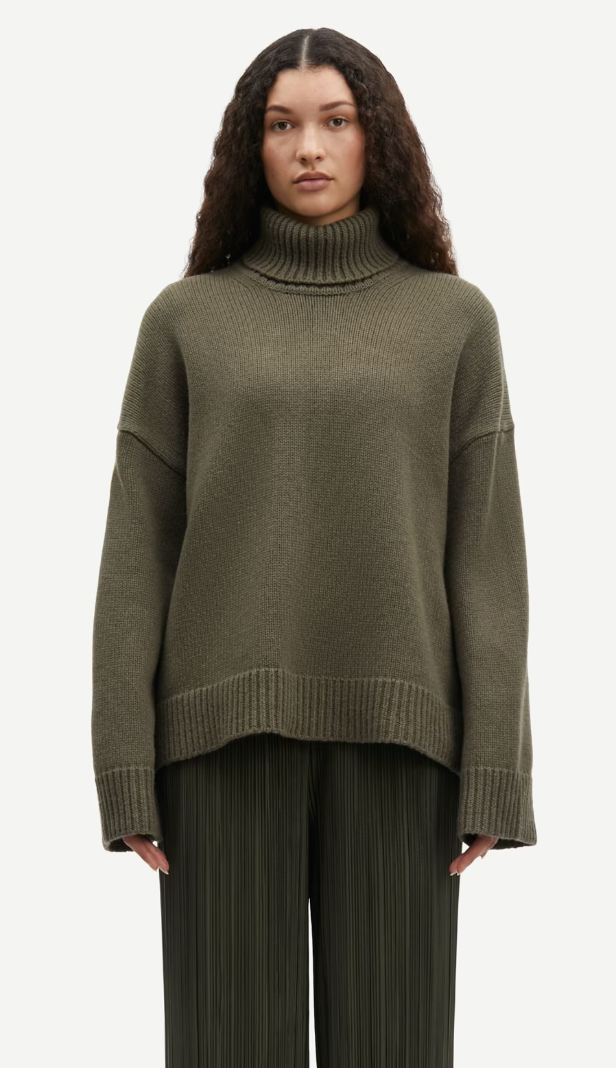 dark green turtle neck ribbed jumper with dropped shoulders