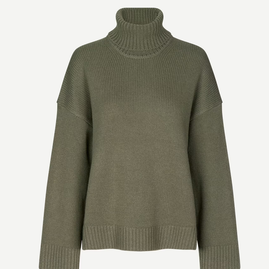 dark green turtle neck ribbed jumper with dropped shoulders